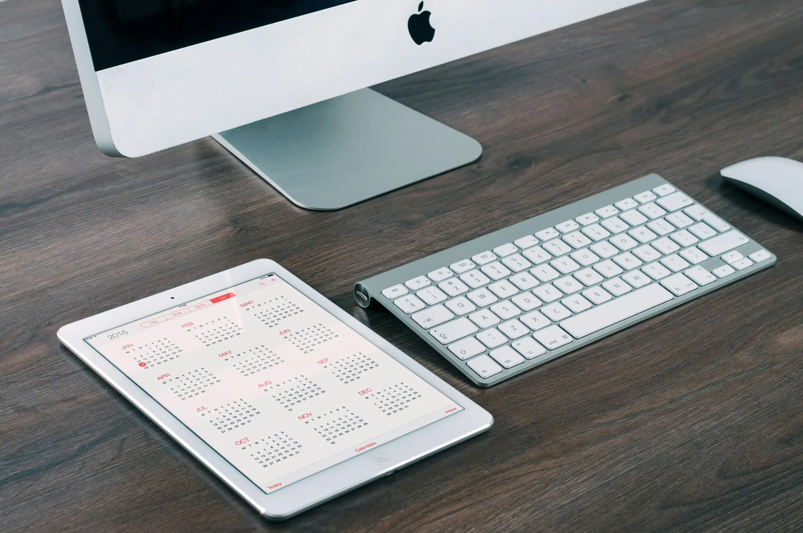 ipad on desk open to a calendar