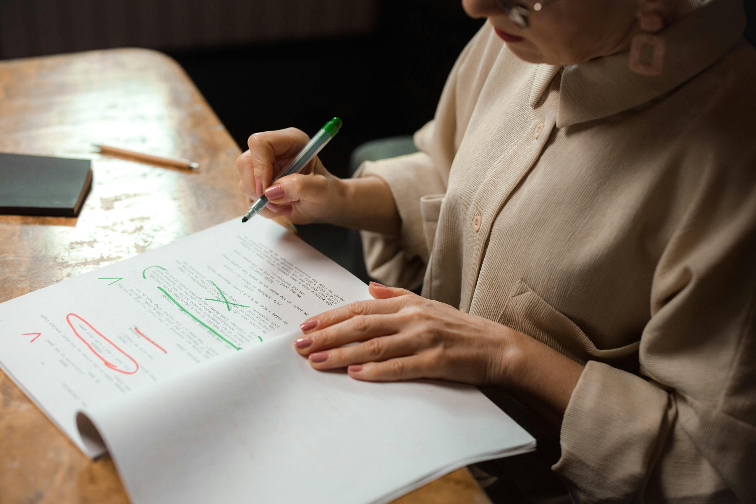 woman proofreading on a table