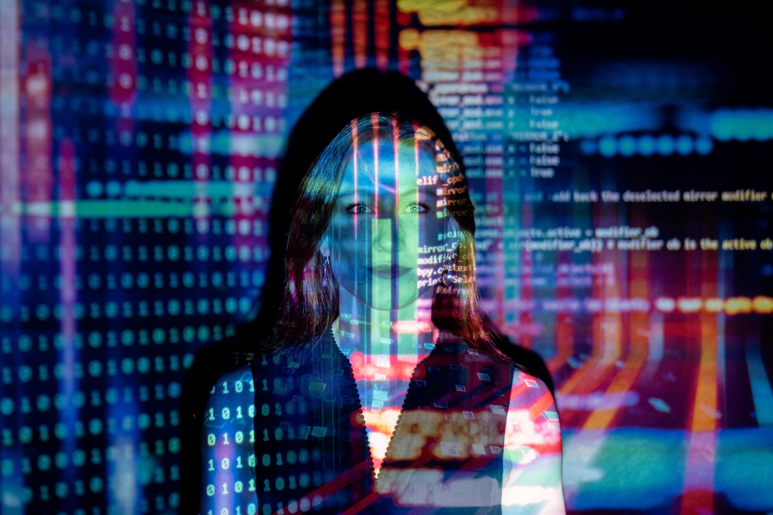image of women's face with code all over the image